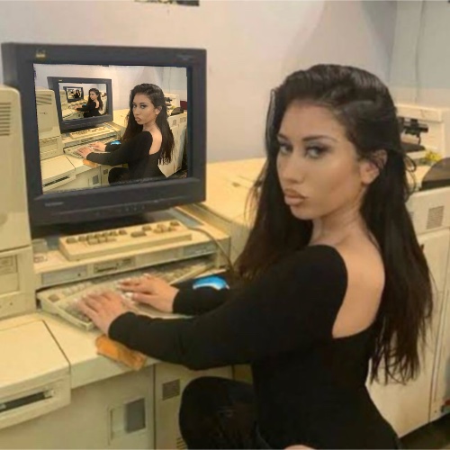 Kali Uchis sitting at a computer meme